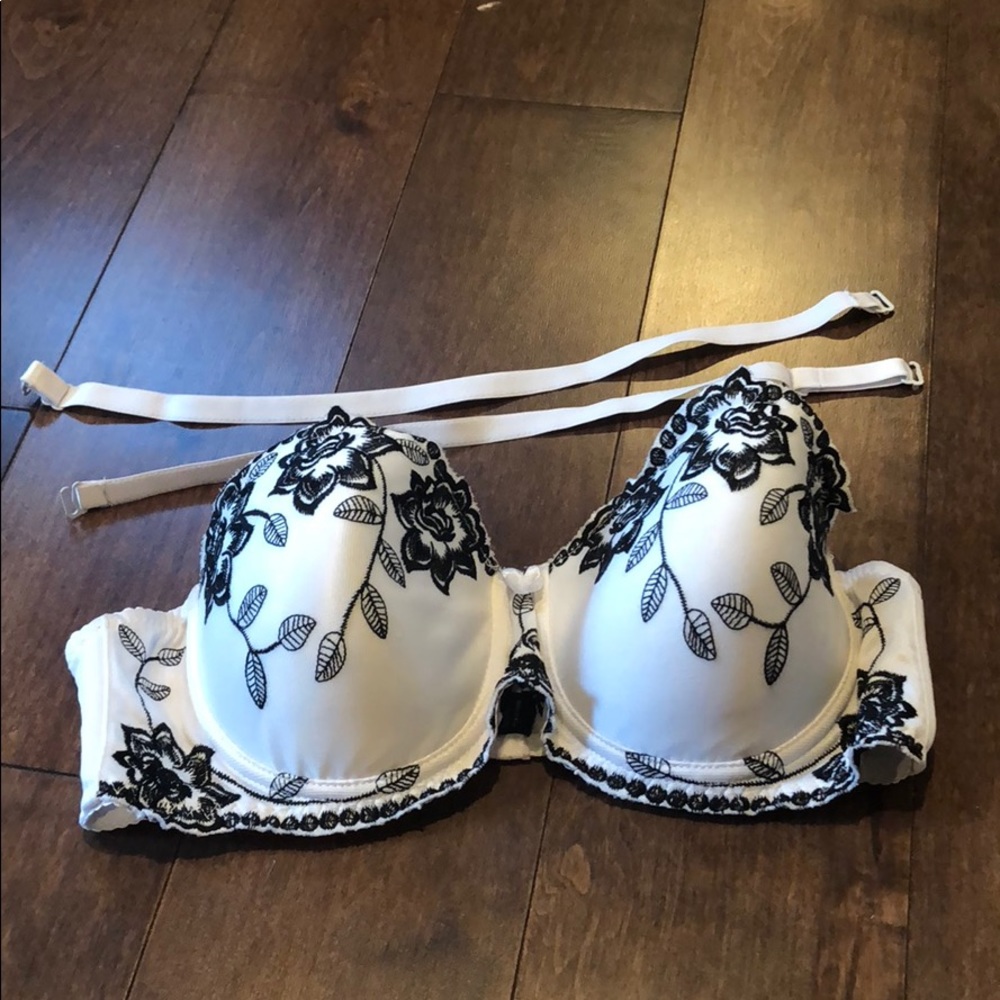 padded white bra with black lace detail